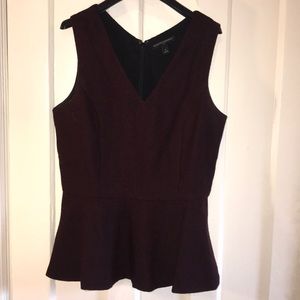 Sleeveless peplum wool blend top